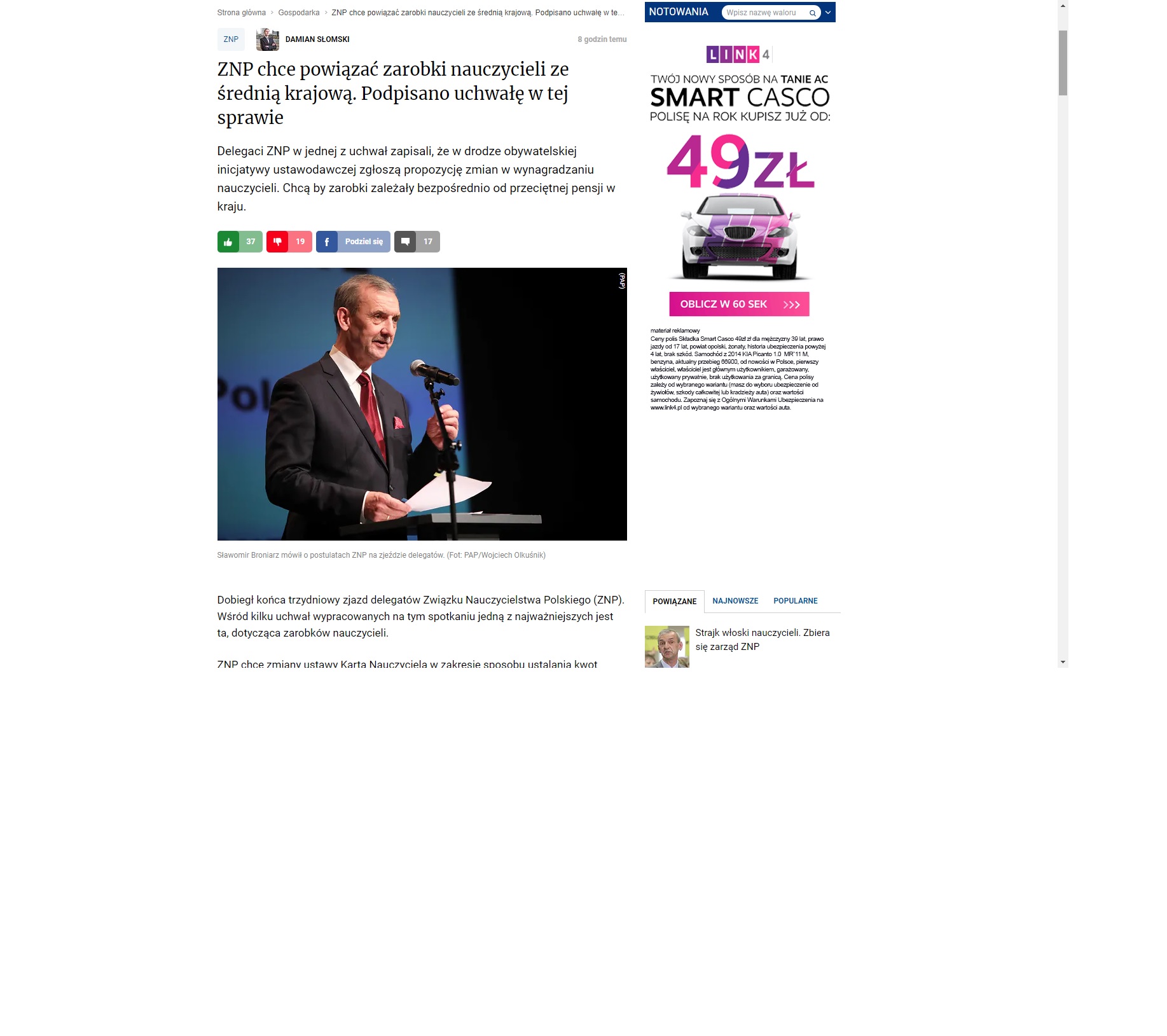 Screen przedstawia zdjęcie prezesa Związku Nauczycielstwa Polskiego, Sławomira Broniarza, ponownie wybranego na tę funkcję podczas XLII Krajowego Zjazdu Delegatów ZNP. 