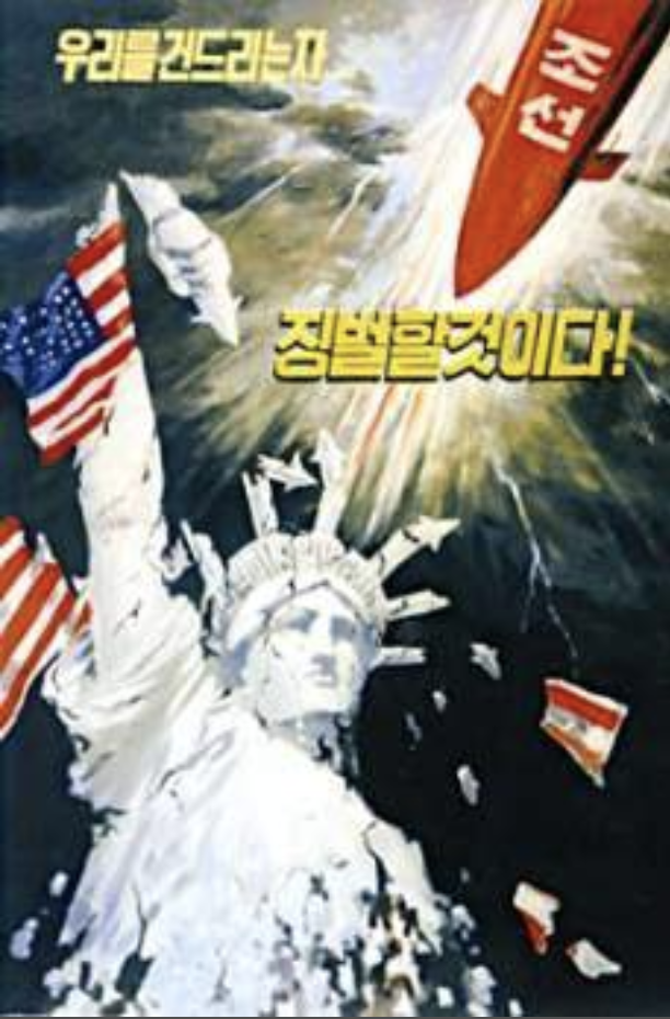 On the left corner of this poster, there is a Statue of Liberty with an American flag. In addition, there is a North Korean bomb at the top right corner that is trying to strike the statue. 